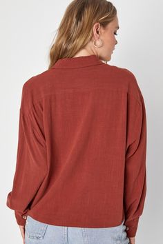 Keep your outfit aesthetic on point with the Lulus Contemporary Charisma Rust Brown Long Sleeve Button-Up Top! Lightweight woven linen-blend fabric shapes long sleeves with button cuffs and a chic collared neckline. Functional button placket and single patch pocket accent the bodice, all atop a slightly cropped hem. Fit: This garment fits true to size. Length: Size medium measures 23" from shoulder to hem. Bust: Great for any cup size. Waist: Not Fitted - comfortable room throughout midsection. Long Sleeve Blouse With Back Button Closure For Fall, Long Sleeve Tops With Back Button Closure, Versatile Fall Blouse With Roll-up Sleeves, Relaxed Fit Long Sleeve Blouse With Back Button Closure, Collared Linen Blouse For Fall, Casual Long Sleeve Blouse With Back Button Closure, Brown Linen Button-up Blouse, Brown Linen Long Sleeve Blouse, Fall Linen Blouse With Shirttail Hem