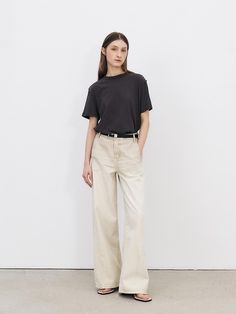 This is a minimal and feminine pants by MOHAN that is made out of high quality and sturdy fabric. With design detail that gives a trendy and refined mood, you can style it with various items for a clean daily outfit. - Mid low rise silhouette- YKK zipper and signature rivets detail- Leather patch on the back High Rise Beige Wide Leg Pants With Relaxed Fit, Neutral Wide Leg Bottoms For Everyday, Neutral Wide-leg Bottoms For Everyday, Beige High-waisted Relaxed Fit Jeans, Everyday Neutral Straight Leg Bottoms, Beige Five Pocket Pants For Everyday, Beige Five-pocket Pants For Everyday, High Rise Beige Pants For Everyday, Beige High Rise Pants For Everyday