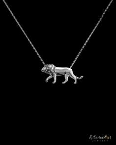 An unique Lion necklace, designed by Amit Eshel. ------------------------------------ Size:  Pendant measures approx. 18.5 x 40 mm (0.7 x 1.55 inches). The box style chain necklace size is 18 inches (45 cm). ------------------------------------ Materials: Sterling silver pendant and chain. Wild Lion, Lion Necklace, Lion Pendant, Animal Pendant, Necklace Size, Wild Animal, Necklace Sizes, Sterling Silver Necklace, Charm Necklaces