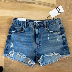 Nwt Medium Blue Distressed Denim, Raw Hem, Zara Shorts. 12 In Rise, 2.5 Inseam Plus Shredding, Approximately 14in Across Waist Line. Perfect Unused Condition Zara Denim Jeans, Pink Denim Shorts, Waist Line, Mom Denim, Cutoff Jean Shorts, Ripped Jean Shorts, White Denim Shorts, Zara Shorts, Blue Jean Shorts