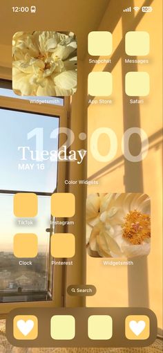 an iphone screen showing the time and date for each window in front of a yellow flower