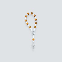 Embrace the serenity of prayer wherever you go with our exquisite Single Decade Pocket Rosary. Meticulously handcrafted with care and devotion. 🌟 Features: - Authentic craftsmanship: Handmade with love and precision. - Compact design: Fits snugly into your pocket, purse, or backpack for easy carrying. - Quality materials: Crafted using high-quality beads. - Elegant aesthetics: Delicately designed to inspire peace and tranquility during prayer. 🙏 Purpose: Designed for those seeking solace in th White 8mm Beads Rosary For Meditation, White Wooden Beads Rosary As Gift, White Rosary With 8mm Beads For Meditation, White Rosary With Round Beads For Meditation, White Rosary With Wooden Beads As Gift, White Spiritual Rosary Bracelet, White Spiritual Beaded Bracelets For Blessing, White Spiritual Beaded Bracelet For Blessing, Spiritual White Beaded Bracelets For Blessing