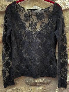 A retro-boho style top-t-shirt, vintage from the 90s. Very feminine with its wide rounded neckline in beautiful elastane lace. This is a top that I bought for myself in the 90s-2000s. It is in perfect condition because I take good care of my stuff. At my age, it's time for me to empty my cupboards... and if it can benefit someone who will find happiness there... You can wear this top on its own but also under a transparent tunic. The materials : - black polyester elastane lace. The cup : - wide Boho Style Tops, Find Happiness, Black Boho, 90s 2000s, Boho Top, Rounded Neckline, Boho Tops, Lace Sleeves, Style Retro