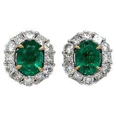 This is one of a kind handcrafted in 18K two tone gold Ring . Emerald is Typically type three gem stone and always inclusion is visible. Even though emerald contain inclusion are very less in this. The earrings is matching par of emerald set with E color Diamonds with VVS1 Clarity certified. The size of the ear studs is perfect size. The pair of earrings is push back .This Earrings will be shipped with certificate and appraisal. Yellow Diamond Earring, Earring Video, Emerald Set, Emerald Diamond Earrings, Diamond Cuff Bracelet, Diamond Jewelry Set, Diamonds Earrings, Diamond Cluster Earrings, Emerald Earrings Studs