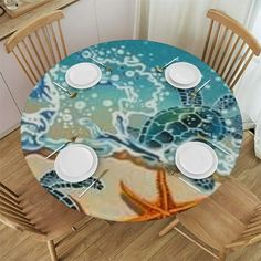 the table is set with plates and place settings for two people to sit at it