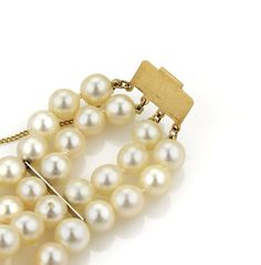 "This gorgeous retro bracelet has four strands of cream tone lustrous 7mm pearls. The rectangular box shape clasp is lovely with filigree floral design and chain attached for added security. Close to the clasp is a long bar on each side securing the strands together. Material: 14k yellow gold Measurement: inner circumference: 6.5\" band is 1.06\" wide x 0.26\" high Weight: 46.2 grams" Classic Multi-strand Jewelry For Formal Occasions, Vintage Yellow Gold Pearl Bracelet For Formal Occasions, Formal Multi-strand Yellow Gold Jewelry, Formal Yellow Gold Multi-strand Jewelry, Elegant Multi-strand Jubilee Bracelet Jewelry, Elegant Double Strand Bracelets For Formal Occasions, Elegant Double Strand Bracelet For Formal Occasions, Elegant Multi-strand Bracelet For Formal Events, Cream Colored Bracelet For Formal Occasions