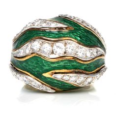 This regal design will captivate everyone!This Vintage 1950's ring, Features textured Green Enameling accents, accented by a channeled pattern throughout of round brilliant cut diamonds.With 37 natural genuine diamonds weigh cumulatively appx. 2.40 caratsand all are of F-G  color and VS clarity.Stamped with purity mark.Currently, a US size is 6.5 and sizable.Remains in Excellent Condition.Accompanied by a professional appraisal document Luxury Antique Collectible Enamel Ring, Regal Design, Jewelry Appraisal, Luxury Timepieces, Enamel Ring, Green Enamel, Gems Jewelry, Selling Jewelry, Buying Jewelry