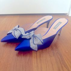 Sjp By Sarah Jessica Parker Paley Shoe In Sold-Out Blue Size 39 But Fits Small So Size 8 Why I Am Selling Them Brand New And Never Worn Except To Try On At Home. Comes With Original Wrapping, Box And Dust Bag Heel Height: 70mm Glitter Fabric Upper Embellished Bow Leather Lining Leather Sole Pointed Toe Signature Grosgrain Detail Blue Pointed Toe Wedding Shoes For Party, Blue Pointed Toe Wedding Shoes For Spring, Spring Wedding Shoes Blue Pointed Toe, Elegant Blue Heels For Spring, Elegant Blue Spring Heels, Elegant Blue Wedding Shoes For Spring, Elegant Blue Wedding Shoes For Summer, Blue High Heels With Bow, Chic Blue Heels For Gala