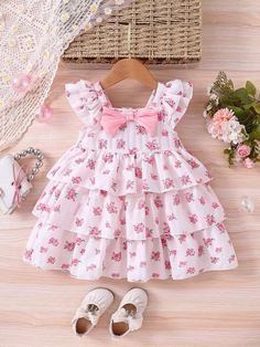 Multicolore  Collar Sans manches Tissu tissé Floral,Plantes,Tout Imprimé Robe à smocks Embellished Pas de l'extensibilité Printemps/Été Baby Frocks Designs Summer, Robe Diy, Baby Summer Dresses, Smocked Baby Dresses, Baby Clothes Patterns Sewing, Kids Blouse Designs, Sewing Baby Clothes