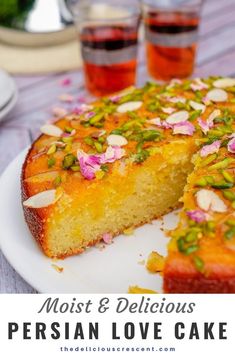 a close up of a cake on a plate with a slice missing from the cake