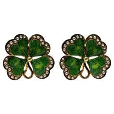 Bring a touch of Victorian charm to your wardrobe with these stunning 14k Victorian Enamel and Seed Pearl 4 Leaf Clover Ear Clips. Made of 14k yellow gold, these ear clips feature delicate enamel details and sparkling seed pearls. In good condition with minor wear, these clips measure 0.75 inches and weigh 6.3 grams. A perfect addition to your jewelry collection! 14k Victorian Enamel and Seed Pearl 4 Leaf Clover Ear Clips Condition: In good condition with some minor surface wear consistent with 4 Leaf Clover, 4 Leaves, Ear Clips, Flower Tops, Seed Pearl, Fine Jewellery Earrings, Leaf Clover, Clover Leaf, Shop Earrings