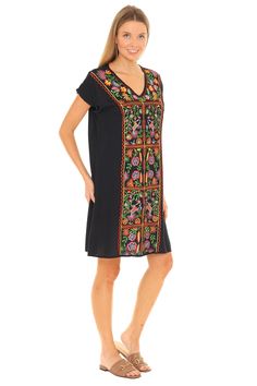 Be ready for warm weather with this chic dress that features a floral pattern and breezy short-sleeve design. Size S: 35'' long from high point of shoulder to hem 100% rayon Machine wash Spring V-neck Rayon Dress With Short Sleeves, Multicolor Short Sleeve V-neck Dress For Vacation, Spring Rayon V-neck Dress With Short Sleeves, Embroidered Short Sleeve Dresses For Summer, Spring V-neck Dress With Short Sleeves In Rayon, Casual V-neck Dress With Embroidered Neckline, Summer Rayon V-neck Dress With Short Sleeves, Summer Short Sleeve V-neck Sundress, Short Sleeve Rayon V-neck Dress For Summer