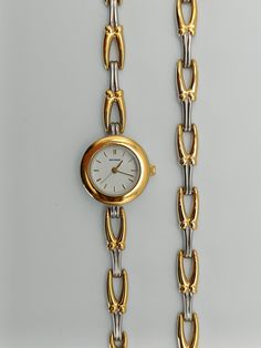 Vintage Sekonda bracelet and watch set, with a gold tone dial, and a two tone stunning watch and bracelet set.  In beautiful condition.  In working order.  Watch length: 18.5cm    Dial width: 2.1cm.  Bracelet length: 17.5cm. Gold Metal Formal Jewelry And Watches, Bracelet And Watch, Sekonda Watch, Watch And Bracelet Set, Watch Set, Watch Bracelet, Men's Watches, Wrist Watches, Chic Boutique