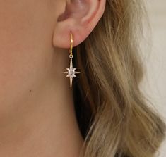 18k gold plated cubic zirconia star earrings with hoop studs. long lasting not easy to tarnish with cubic zirconia sparkle like real diamonds and reflects rainbow gloss in sunshine. drop size: 21.5mm long, 12.5mm wide, 3.5mm thick. minimalist and elegant earrings makes it perfect for everyday wear and a great gift for mother, sister, friend, bridesmaid. Elegant Hypoallergenic Star Hoop Earrings, Cubic Zirconia Drop Earrings With Star Charm, Minimalist Star-shaped Cubic Zirconia Jewelry, Gold Star Earrings, Bow Necklace, Earrings Bridesmaid, Women Earrings, Earrings Hoop, Bow Earrings