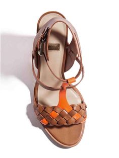 Retro T-strap Sandals For Spring, Spring T-strap Heels With Leather Sole, Bold Leather Open Toe Sandals, Brown T-strap Heels For Summer, Spring T-strap Sandals With Stacked Heel, Bold Ankle Strap Sandals For Spring, Modern T-strap Heels For Summer, Summer T-strap Heels With Stacked Heel, Spring Leather T-strap Heels