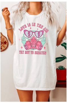 Welcome to my shop, I'm so happy you're here! These shirts are great for everyday wear! They will style perfectly with laid-back leggings look or with a cute pair of jeans. There are many ways you can style this tee. You can tuck it up under a sports bra for a cropped look, you can tie it in a knot on the side, you can tuck it in, or just wear it as is. No matter which way you wear it you are going to look amazing!  If you love the oversized T shirt look like the model in the picture, then make Valentine's Day Casual T-shirt With Funny Print, Valentine's Day Graphic Tee With Slogan, Cute Relaxed Fit Top For Valentine's Day, Cute Slogan Tops For Valentine's Day, Valentine's Day Graphic Print Top, Relaxed Fit, Valentine's Day Graphic Print Top With Relaxed Fit, Valentine's Day Graphic Print Relaxed Fit Top, Valentine's Day Graphic Print Relaxed Top, Valentine's Day Cute Slogan Tops