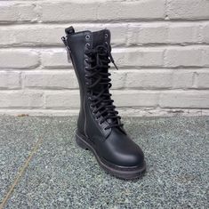 The Demonia Bolt-300 Is A Black Calf-High Boot With Front Lacing And A Side Zip Closure. Us Men's Sizing. #Demoniabolt #Bolt300 #Demonia Black Urban Combat Boots With Round Toe, Urban Black Combat Boots With Round Toe, Black Lace-up Urban Combat Boots, Urban Black Lace-up Combat Boots, Black Moto Boots With Steel Toe, Urban Black Combat Boots For Streetwear, Black Round Toe Moto Boots With Laces, Black Moto Boots With Laces And Round Toe, Black High-top Moto Boots With Laces