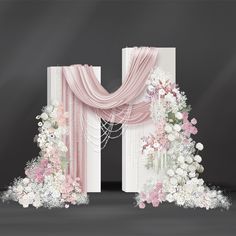 an open door decorated with pink and white flowers, pearls and chains hanging from it's sides