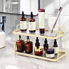 a bathroom shelf with several different types of skin care products on it and a mirror in the background