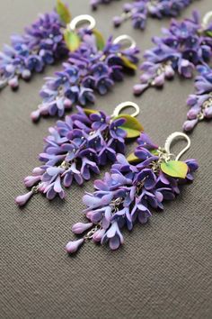 Several pairs of these lovely lavender earrings were delivered to their owners at the same time today.  I'll let you in on a secret: Each pair has a five-petal flower - for happiness and good luck!     Find a lilac flower with 5 petals:   Attitudes towards the miraculously changing reality of one's own life are created;   Eliminate doubts about fulfilling desires;   The habitual tension of thought dissipates somewhere;   Stress, resentment, anger go away.   There is also another pair of earrings Purple Flower-shaped Whimsical Jewelry, Handmade Lavender Drop Earrings, Whimsical Purple Flower Jewelry, Purple Dangle Flower Earrings For Pierced Ears, Unique Purple Flower Earrings, Whimsical Purple Flower-shaped Jewelry, Handmade Purple Whimsical Flower Earrings, Handmade Purple Flower Earrings Whimsical Style, Purple Handmade Whimsical Flower Earrings