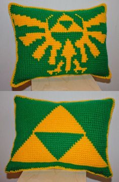 two green and yellow knitted pillows with the legend of zelda symbol on them