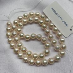 Details We carry a large selection of Akoya pearls on Etsy.com at wholesale prices. 7.0-7.5 mm High Luster White AAA Baroque Japanese Akoya Cultured Pearl, 16", would string to 18" with knots and clasp Good For wedding, graduation, anniversary. Pearl Information Surface markings and blemishes  lightly-blemished Shape                  Baroque Uniformity            Very-good Luster                  High-luster Minimum color  White  Size per pearl 7.0-7.5 mm Pearl type          Akoya cultured For r High Luster Round Akoya Pearl Necklace, Akoya Pearl Necklace With Round Beads, Hand-strung Round Pearl Necklace Gift, Single Strand Round Pearl Necklace, Hand-strung Pearl White Necklace With Round Beads, Hand-strung Pearl White Round Beads Pearl Necklace, Formal Hand-strung Pearl Necklace With Round Beads, Formal Hand-strung Round Bead Pearl Necklace, Hand-strung Round Beads Pearl Necklace