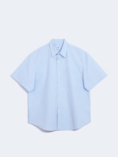 Editor's NotesThis casual oversized button-down shirt is made from high-density cotton-nylon blend. It's designed with a single pocket and reversed seam finish.- Collared neck- Button fastenings- One chest pocket- Drop shoulder- Short sleeves- Curved hem- Oversized fitMeasurements (in.) M / L- Shoulder: 22.2 in. / 22.8 in. - Chest: 23.8 in. / 24.6 in.  - Sleeve Length: 10.8 in. / 10.8 in. - Total Length: 30.7 in. / 31.3 in.  Composition & Care- 69% Cotton, 31% Nylon- Dry clean- Do not tumble Blue Shirt With Patch Pockets For Spring, Spring Blue Shirt With Patch Pockets, Classic Oversized Collared Shirt, Blue Spring Shirt With Patch Pockets, Spring Poplin Tops With Relaxed Fit, Relaxed Fit Short Sleeve Poplin Shirt, Solid Cotton Shirt With Patch Pockets, Collared Poplin Tops With Button Closure, Collared Poplin Top With Button Closure