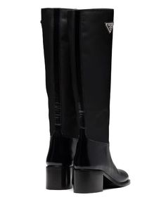 Shop black Prada triangle-logo calf-length boots with Express Delivery - Farfetch Black Waterproof Knee-high Boots For Fall, Waterproof Black Knee-high Boots For Fall, Classic Black Mid-calf Boots With Reinforced Heel, Modern Black Knee-high Boots For Business, Sleek Calf Leather Winter Boots, Modern Patent Leather Knee-high Boots, Designer Calf Leather Boots With Rubber Heel Cap, Black Knee-high Calf Leather Heeled Boots, Modern Knee-high Patent Leather Boots