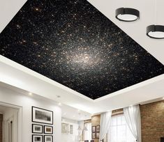 a living room filled with furniture and a ceiling covered in firecrackers on the ceiling