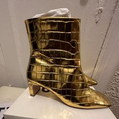 New Never Worn In Box Gold Ankle Boots From Schutz. Tilane Gold Croc Print Boots. 2-2.5 Inch Heel. Size 11. Price Firm No Negotiating They Are New. Gold Flat Heel Heels For Fall, Chic Gold Ankle-high Boots, Gold Heeled Boots With Reinforced Heel For Fall, Gold Boots With Reinforced Heel And Round Toe, Gold High Heel Boots With Reinforced Heel, Gold Ankle Boots For Fall, Gold Round Toe Heeled Boots For Fall, Gold Heeled Boots With Round Toe For Fall, Gold Ankle-high Boots With Reinforced Heel