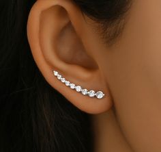 Sterling Silver Climbers with Cubic Zirconia stones. ☑ Set: pair of earrings; ☑ Material: sterling silver (silver 925), White cubic zirconia; ☑ Total length: 1.14 inches (2,9 cm); Silver Cubic Zirconia Ear Climbers For Wedding, Silver Diamond Ear Climbers With Accents, Elegant Silver Ear Climbers With Diamond Accents, Elegant Silver Ear Cuff With Diamond Accents, Elegant Silver Cubic Zirconia Ear Climbers, Silver Cubic Zirconia Ear Cuff With Diamond Accents, Silver Ear Climbers With Diamond Accents, Silver Ear Cuff With Diamond Accents, Silver Sterling Silver Ear Climbers With Diamond Accents