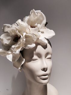 Magnolia- Off White Fascinator -Flower Fascinator- Ivory Headband- Horse Race- Derby- Wedding- Garden Party- Polo Match- JazzAge- Billie Holiday Hello, This fascinator is made with several ivory magnolia blossoms are 6 inches wide. It placed on magnolia leaves. It is attached to a satin covered skinny headband and is adjustable. It's very comfortable and will fit any size head. Colors available: Pink Ivory (shown) Cream pink (Custom colors on request) Veil: $100. plain no veil $75.00 ----------- Garden Ceramics, Headpiece Art, Pink Veil, Ivory Fascinator, Derby Wedding, White Fascinator, Bohemian Weddings, Flower Headdress, Pink Fascinator