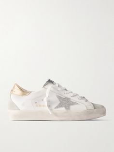 To create their lived-in look, Golden Goose's 'Super-Star' sneakers are distressed by hand using patented brushing and waxing techniques. Made from supple leather and suede, they have metallic logo-embossed heel tabs and embellished star appliqués. Wear yours with everything from cropped jeans to midi skirts. White Golden Goose, Denim Sneakers, Flat Dress Shoes, Golden Goose Shoes, Golden Goose Deluxe Brand, Brown Sneakers, Super Star, Latest Sneakers, Star Sneakers