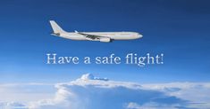 an airplane is flying in the sky above clouds with words have a safe flight on it