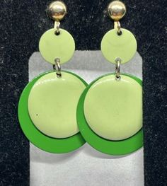 Vintage MCM Shade of Green Enamel Gypsy Discs Dangling Clip Earrings  | eBay Retro Adjustable Drop Earrings, Adjustable Retro Drop Earrings, Green Enamel Clip-on Jewelry, Green Metal Clip-on Earrings, Adjustable Nickel-free Retro Earrings, Green Enamel Clip-on Earrings, Pierced Dangle Earrings In Enamel, Retro Metal Dangle Earrings, Retro Dangle Metal Earrings