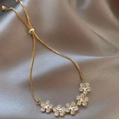 Nwt Adjustable Diamond & Gold Flower Bracelet Diamond Gold Bracelet, Gold Flower Bracelet, Diamond Gold, Gold Flower, Flower Bracelet, Gold Flowers, Earring Necklace, Wedding Stuff, Womens Jewelry Bracelets