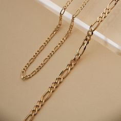 Length: 18" or 22"Width: 3.9mm Thickness: 1.5mm Weight:8.4-10.1g Specs Description: Italian Gold Chain, Gold Figaro Chain, Gold Chain Design, Figaro Chain Necklace, Figaro Chains, Figaro Chain, Gold Chain Jewelry, Gold Bracelet Chain, Jewelry Photography