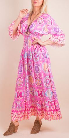 Ikat Print Maxi Dress with V-Neck and Ruched Waist. Features Ruffle Detail on 3/4 Length Sleeves and Bottom Hem. 100% Viscose Made in Italy One Size Fits Most Model is 5'7 Ikat Dress, Made Dress, Ikat Print, Printed Maxi, Dress For Women, Printed Maxi Dress, Handbags On Sale, Midi Length, Dress Making