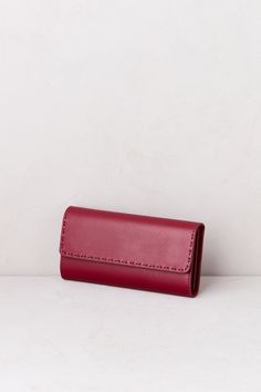 Designed for ultra-organization, the women's leather wallet is packed with all the details you need to hold all your credit cards, IDs, checkbook, cash, and more all in one place and right at your fingertips. This wallet is crafted of soft yet durable leather that easily coordinates with all your other accessories, making it an everyday essential you'll appreciate for many years. Trifold Wallet With Cell Phone Pocket, Trifold Wallets With Cell Phone Pocket For Daily Use, Trifold Wallet With Cell Phone Pocket For Daily Use, Daily Use Trifold Wallet With Cell Phone Pocket, Leather Coin Purse With Interior Key Chain Holder, Rectangular Wallets With Card Slots For Daily Use, Leather Rfid Blocking Card Holder, Daily Use Wallets With Card Slots And Rectangular Case, Daily Use Wallet With Card Slots And Rectangular Shape