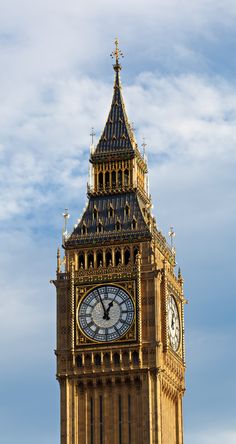 the big ben clock tower towering over the city of london