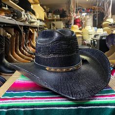 Really nice men's black cowboy hat perfect for any occasion! Solid strong, durable, and comfortable ideal for any event and activity. Made with breathable material with ventilated ports to stay cool and feel the breeze. Water & sweat proof made to protect and keep cool during any weather as well keep you cool. Has an elastic band for a nice comfort fit made 100% from Mexico! Available in all sizes small- X Large!  Sizing: Small - 6 7/8 (55 cm) Medium - 7 (56 cm) & 7 1/8 (57 cm) Large - 7 1/4 (58