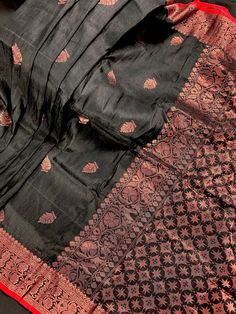 Gorgeous Black and Red Color Linen Silk Handloom Saree with floral buttis on the body of the saree with a grand pallu. Saree has Copper Zari Weaving. Item: SareeColor : Black and Red Base Fabric: Linen Silk Handloom Blouse piece : YesBlouse material: Linen Silk Handloom Fall & Edging: (Yes/No) : YesDisclaimer -:- Color variation is possible due to various reasons like phone or desktop setting, resolution etc. Please don't hold us responsible. Our aim is to put the exact color of the Saree.- If t Black Chanderi Pre-draped Saree With Self Design, Black Cotton Silk Pre-draped Saree For Festivals, Black Banarasi Silk Pre-draped Saree With Self Design, Black Silk Pre-draped Saree With Self Design, Black Slub Silk Saree, Traditional Black Cotton Silk Pre-draped Saree, Black Cotton Silk Saree For Wedding, Black Slub Silk Dupatta With Self Design, Black Cotton Silk Dupatta With Self Design