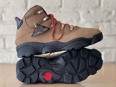 Elevate your shoe game with these winterized Nike Air Jordan 6 Rings boots in rocky tan. Featuring a lace-up closure and a low-top shoe shaft style, these limited edition sneakers are perfect for any casual or activewear occasion. With a solid pattern and brown-black color, they are both stylish and versatile. Water resistant shoes Made from blended fabric, these boots are breathable, water-resistant, and cushioned for maximum comfort and performance. The outsole is made of rubber for superior g Air Jordan 6 Rings, Water Resistant Shoes, Training Basketball, Jordan 6 Rings, Tan Sneakers, Nike Air Jordan 6, Limited Edition Sneakers, Tan Boots, Air Jordan 6