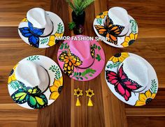 Beautiful Sunflower, Butterfly and Birds Designs Hand painted hats Size M 21-22 Artisan Multicolor Panama Hat With Short Brim, Artisan Handmade Sun Hat For Spring, Handmade Artisan Sun Hat For Spring, Artisan Multicolor Fedora Straw Hat, Handmade Multicolor Fedora Sun Hat, Multicolor Handmade Country Hats, Custom Handmade Summer Hats, Handmade Multicolor Country Hat, Multicolor Fedora With Curved Brim For Country Events