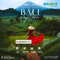 a woman in a red dress and white hat is looking out over the rice fields