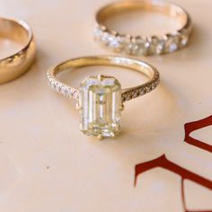 three different types of rings on a table