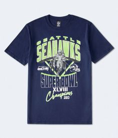 a blue t - shirt with an image of a motorcycle rider on it and the words sea hawk's super bowl champs