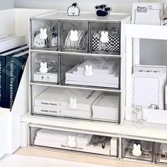 a white shelf filled with lots of different items