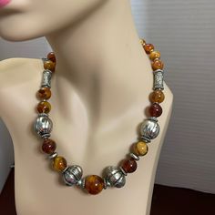 See Photos For Best Description. New With Tag. 18”Length Orange Polished Beads Necklace, Adjustable Amber Beaded Necklace With Large Beads, Orange Polished Beads Necklaces For Jewelry Making, Adjustable Amber Necklace With Colorful Beads, Amber Beaded Necklaces With Colorful Beads, Brown Necklaces With Silver Round Beads, Brown Necklace With Silver Round Beads, Lucite Jewelry, Baltic Amber Jewelry