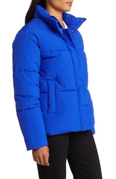 Get ready for temperature dips in this minimalist puffer jacket that delivers style and warmth—all in one layer. A covered placket and high collar keep chills at bay. 26" length (size Medium) Stand collar Front welt pockets Lined, with 100% polyester fill 100% polyester Made in China Cold Weather Solid Puffer Jacket With Padded Collar, Solid Puffer Jacket With Padded Collar For Cold Weather, Blue Weatherproof Puffer Jacket For Winter, Functional Blue Puffer Outerwear, Blue Weatherproof Puffer Jacket For Cold Weather, Down Puffer Jacket With Zipper Closure, Spring Down Puffer Jacket With Zipper Closure, Weatherproof Down Puffer Jacket With Long Sleeves, Blue Insulated Puffer Jacket For Cold Weather